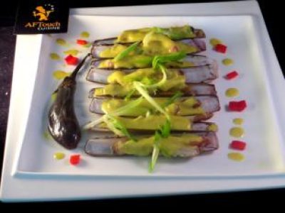 Recette Couteaux crème de curcuma et premiers aillets