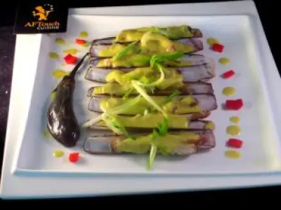 Recette Couteaux crème de curcuma et premiers aillets