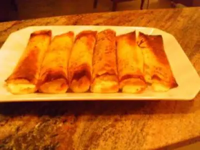 Recette Crêpes soufflées au citron et coulis de fruits rouges.