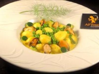 Recette Gnocchi moules et petits pois en safranée
