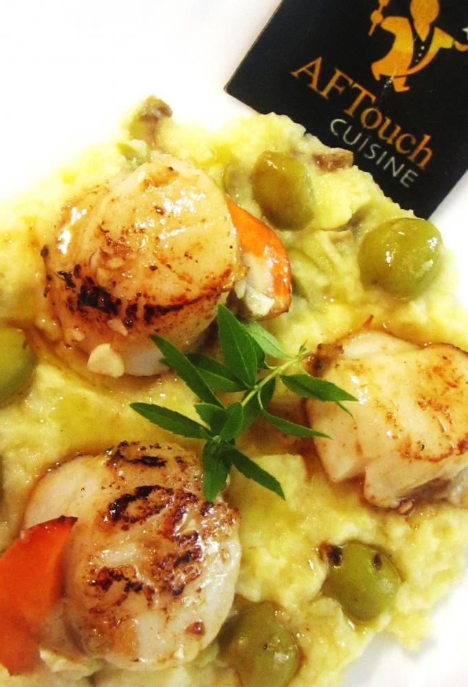 St jacques rôties sur purée de panais aillée